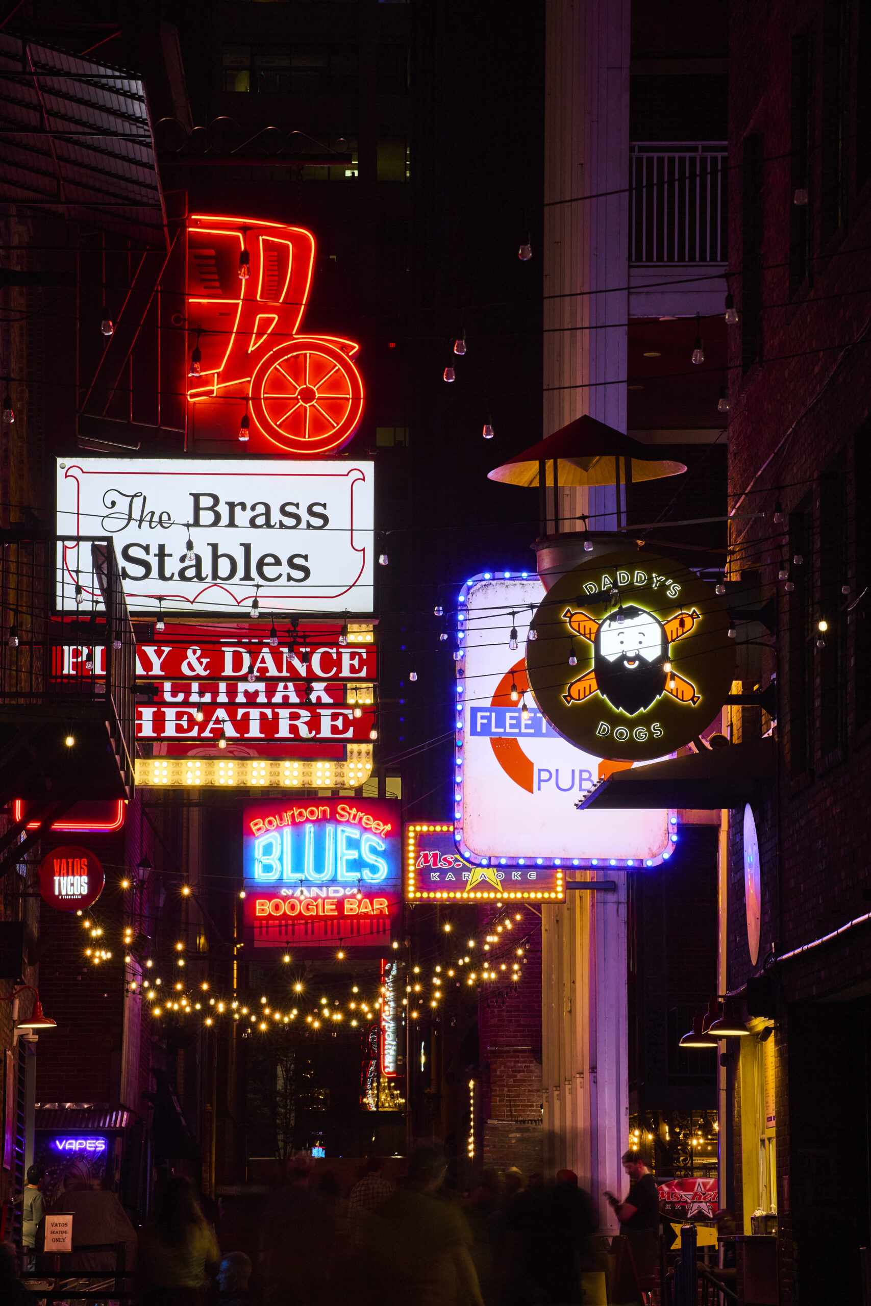 Vibrant neon lights and nightlife on Sixth Street in Austin Texas