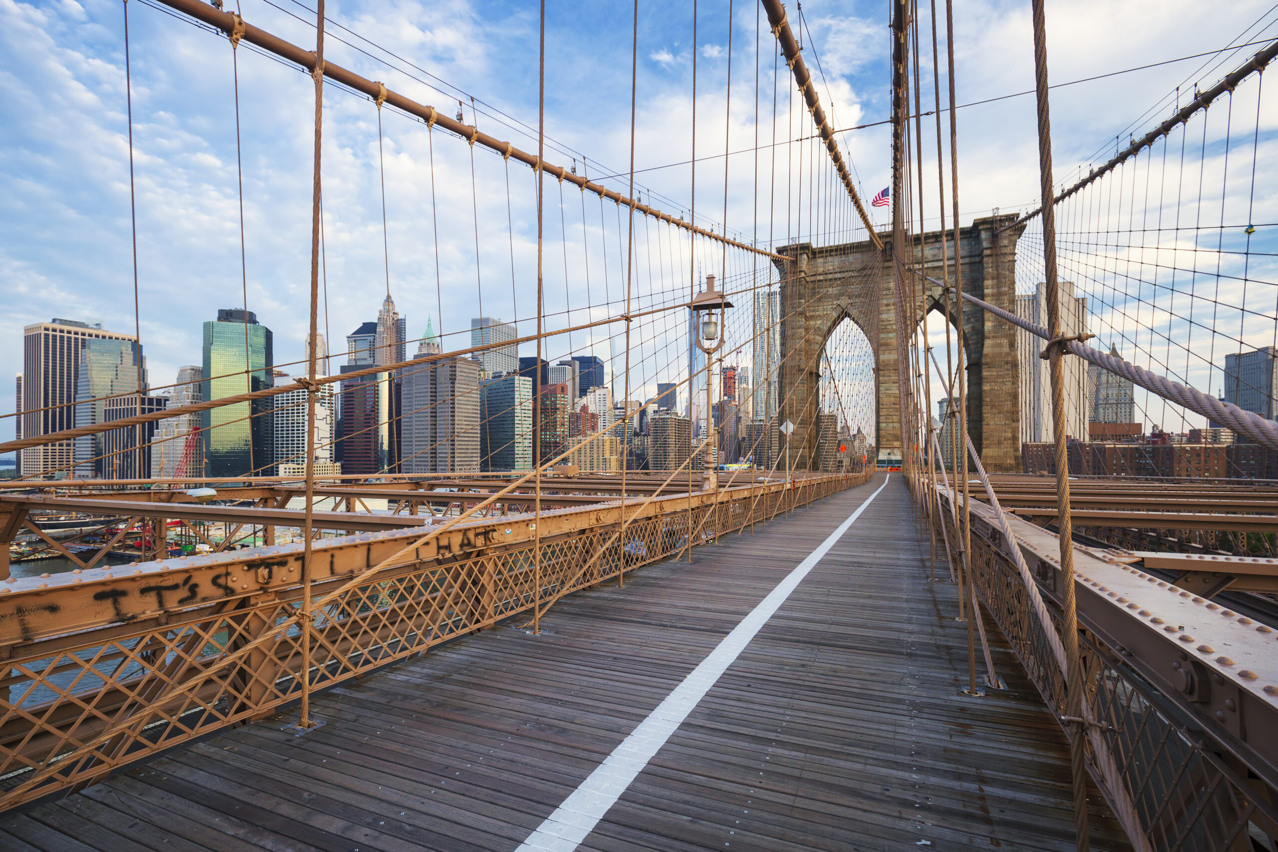 New York City Brooklyn Bridge with Manhattan skyscrapers and city skyline
