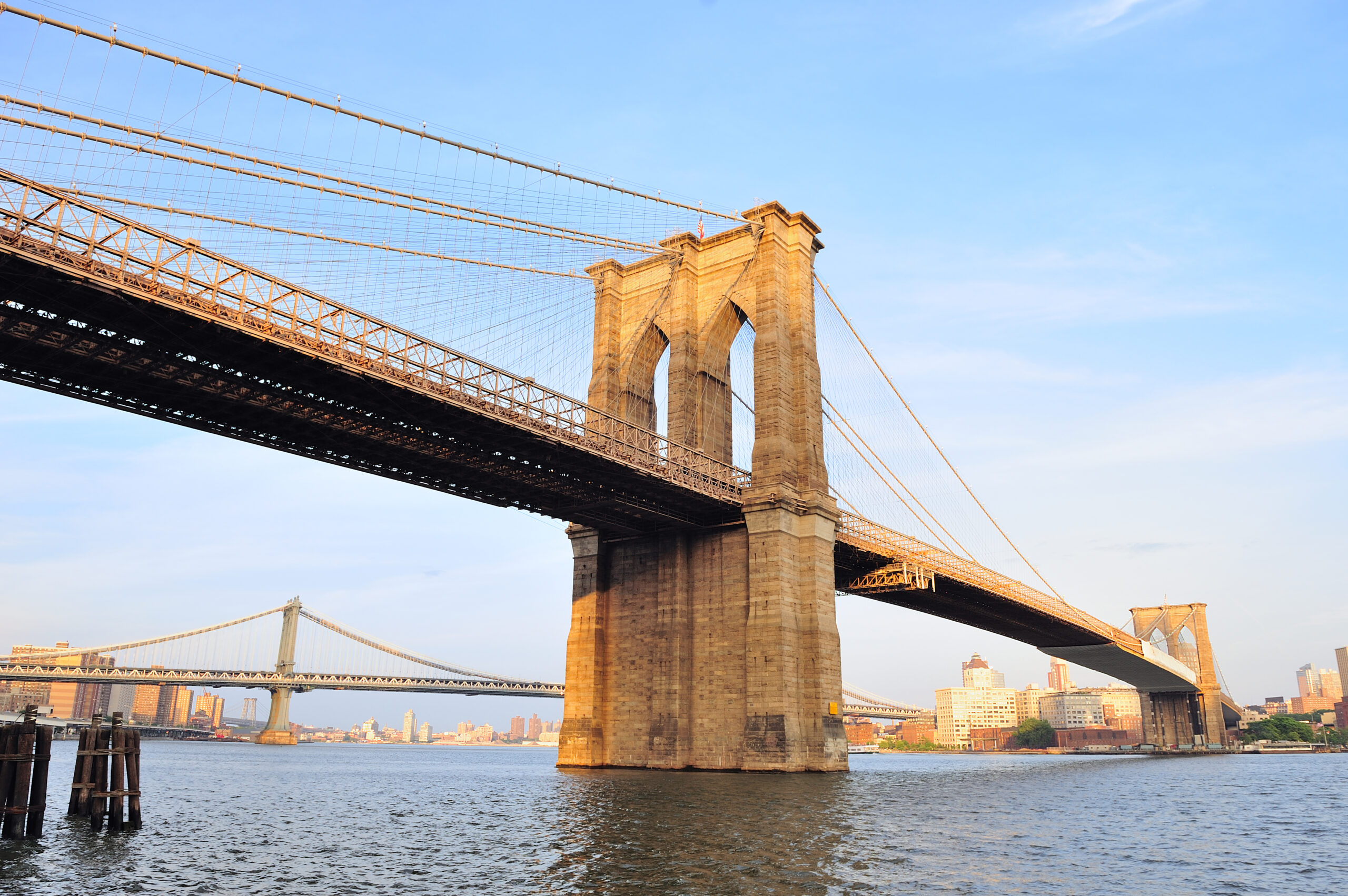 Brooklyn Bridge from the Manhattan waterfront at sunset