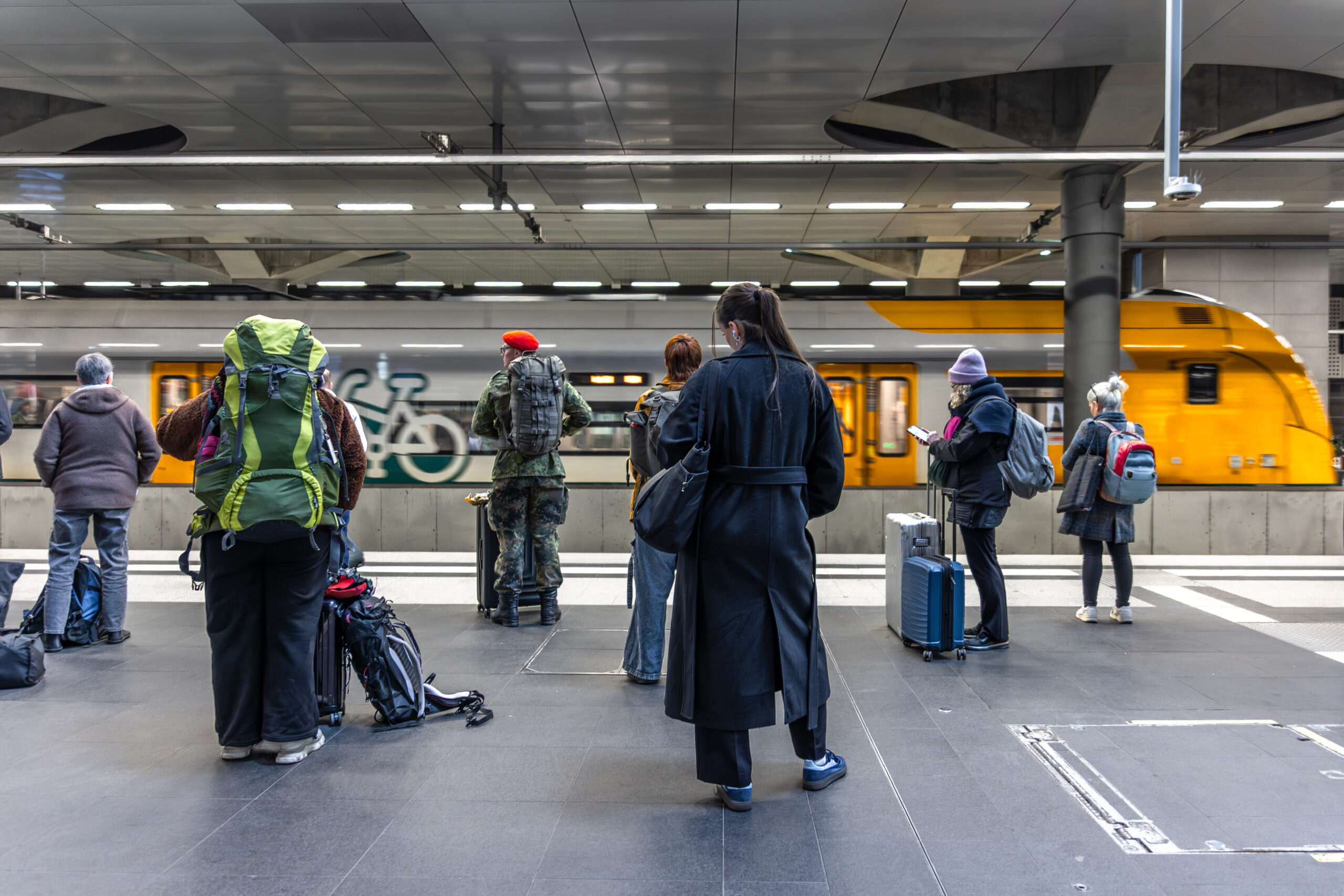 Commuters waiting on a New York City subway platform